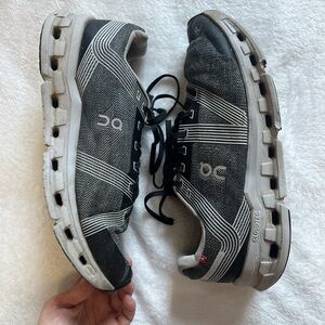 On Cloudgo men’s running sneakers in the Black/Glacier colorway